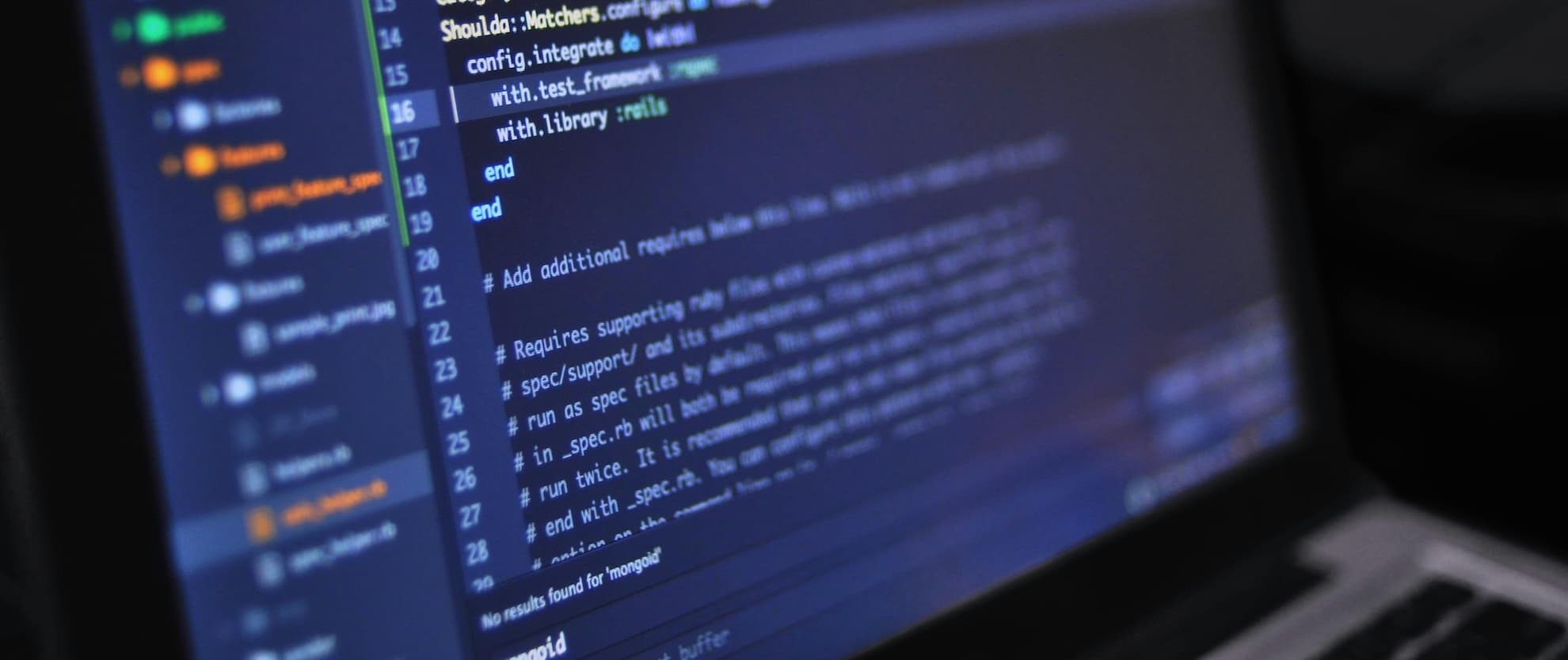 Computer with code on screen